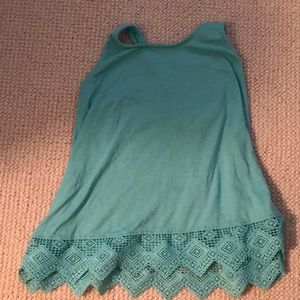 It’s a light blue tank top from old navy